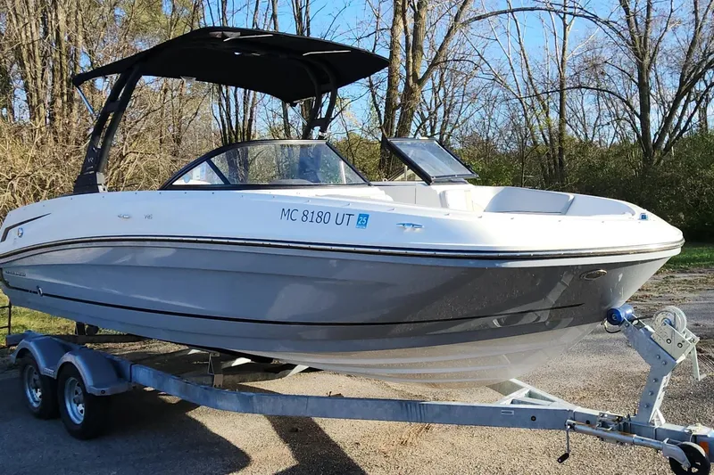 Slide: The Image of 2022 Bayliner VR6 Bowrider OB on trailer, parked outdoors. - 31