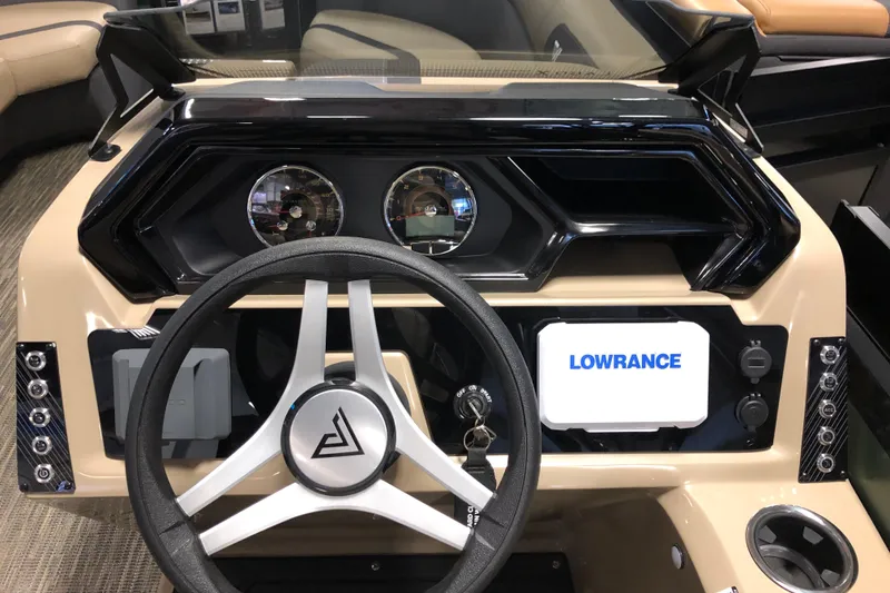 Slide: The Image of Dashboard of 2026 Viaggio X22S boat with steering wheel and Lowrance display. - 12