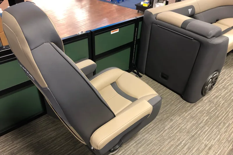 Slide: The Image of 2026 Viaggio X22S boat seating with beige and gray upholstery, showcasing modern design. - 13