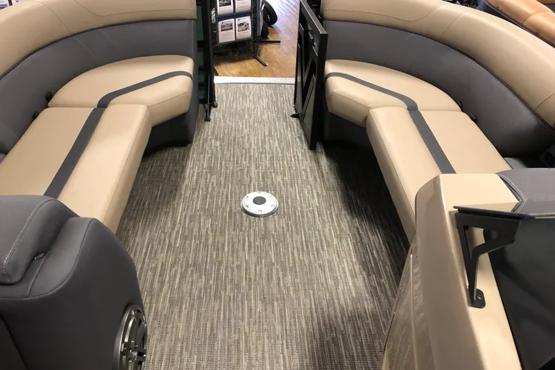 Slide: The Image of Interior of 2026 Viaggio X22S boat with beige and gray seating. - 14