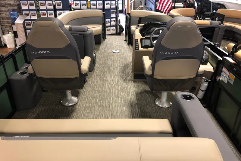 Slide: The Image of 2026 Viaggio X22S boat interior with plush seating and modern dashboard. - 5