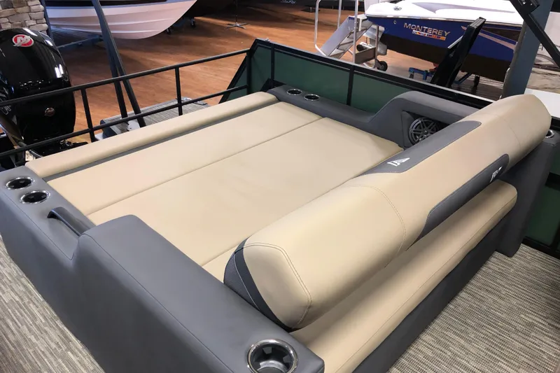 Slide: The Image of Luxurious seating on 2026 Viaggio X22S boat, featuring beige and gray upholstery. - 7