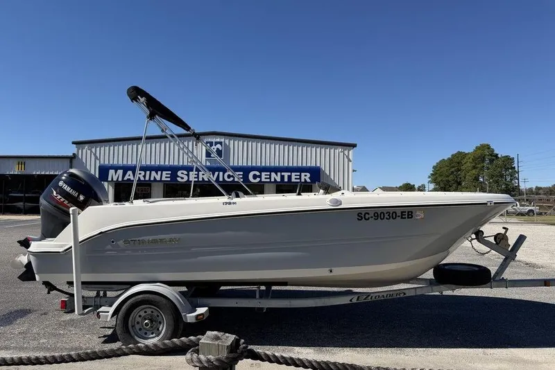 Slide: The Image of 2023 Stingray 172SC boat on trailer at Marine Service Center. - 4
