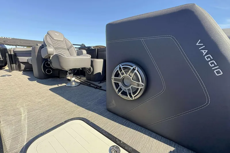 Slide: The Image of 2025 Viaggio D26U boat interior with luxury seating and speaker system. - 11