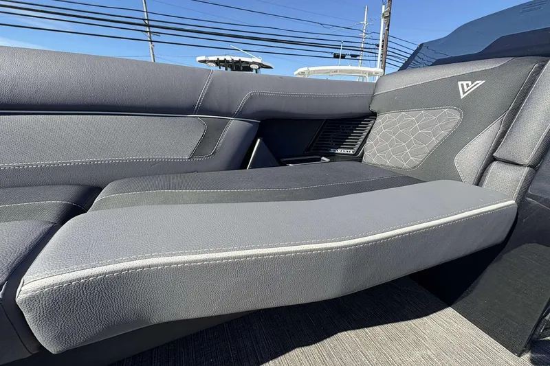 Slide: The Image of 2025 Viaggio D26U boat interior with sleek gray seating and modern design. - 13