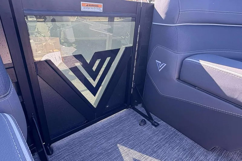 Slide: The Image of Interior of 2025 Viaggio D26U with logo on seat and glass partition. - 18