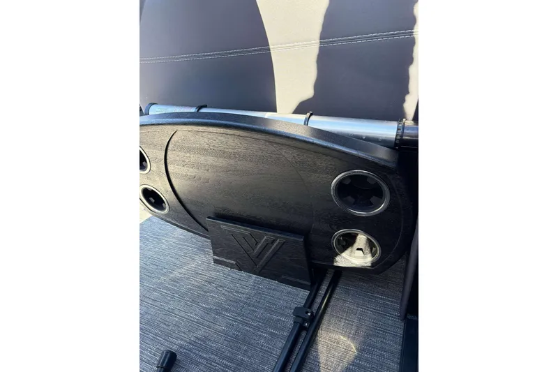 Slide: The Image of 2025 Viaggio D26U interior with cup holders and sleek design. - 22