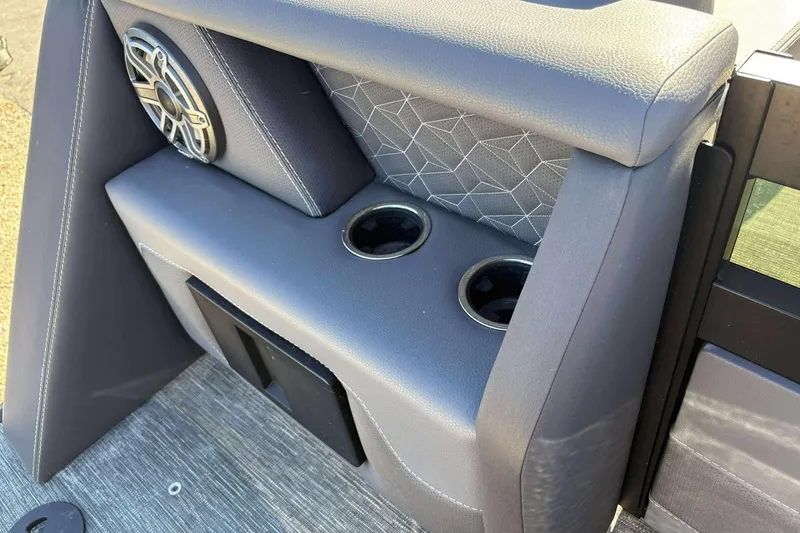 Slide: The Image of Viaggio D26U 2025 boat interior with speaker, cup holders, and geometric upholstery design. - 27