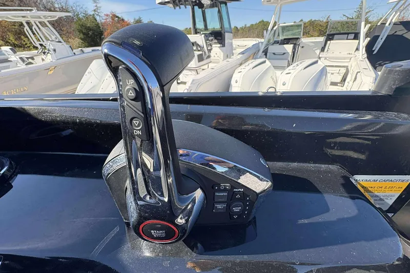 Slide: The Image of Close-up of a Viaggio D26U 2025 boat throttle control with start-stop button. - 8