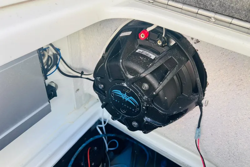 Slide: The Image of 1996 Baja .38 Special boat engine compartment with air conditioning system and wiring. - 100