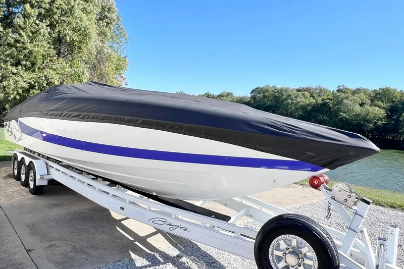 Slide: The Image of 1996 Baja .38 Special boat detail with blue and white exterior, metal railing. - 106