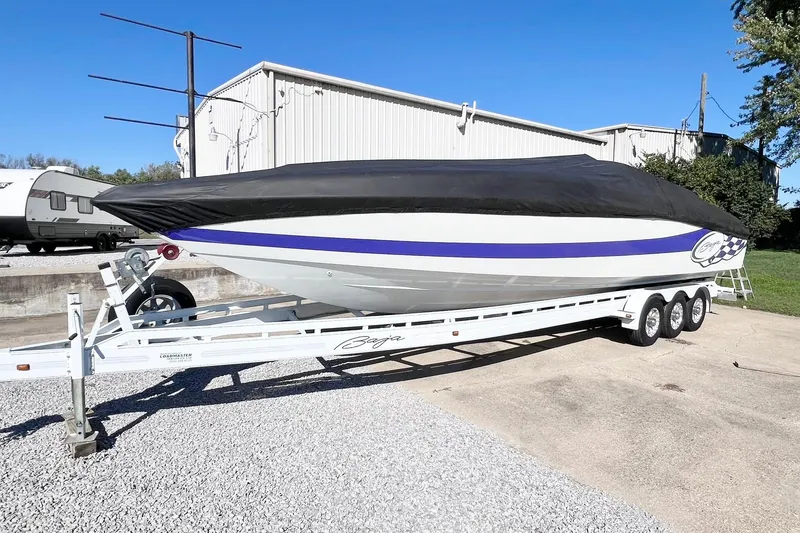 Slide: The Image of Close-up of 1996 Baja .38 Special boat with blue and white wave design. - 107