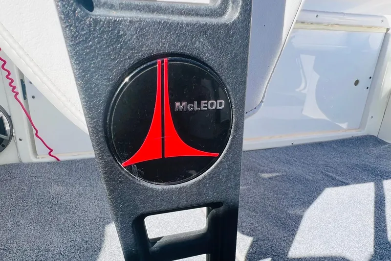 Slide: The Image of 1996 Baja .38 Special boat interior with McLeod logo on black panel. - 46