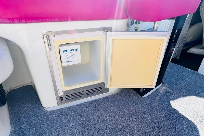 Slide: The Image of 1996 Baja .38 Special boat interior with open Icer-Ette ice maker. - 48