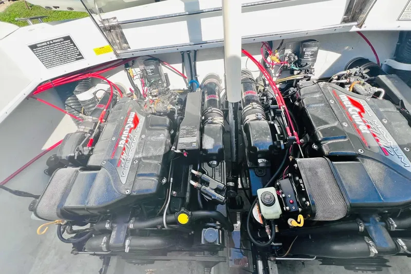 Slide: The Image of Twin engines in a 1996 Baja .38 Special boat, showcasing powerful marine performance. - 73