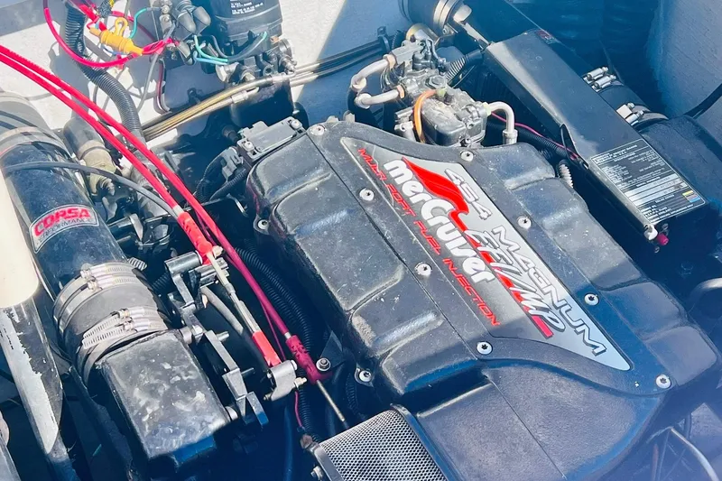 Slide: The Image of Engine compartment of a 1996 Baja .38 Special boat with MerCruiser 454 Magnum EFI. - 77