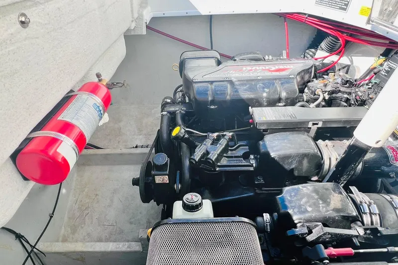 Slide: The Image of Engine of a 1996 Baja .38 Special boat, featuring Mercury Magnum MPI. - 81