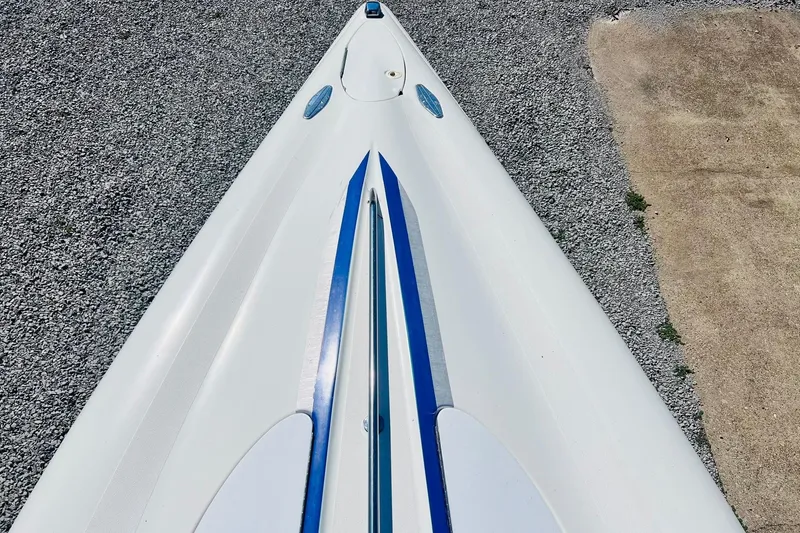 Slide: The Image of Top view of a 1996 Baja .38 Special boat with blue accents. - 91