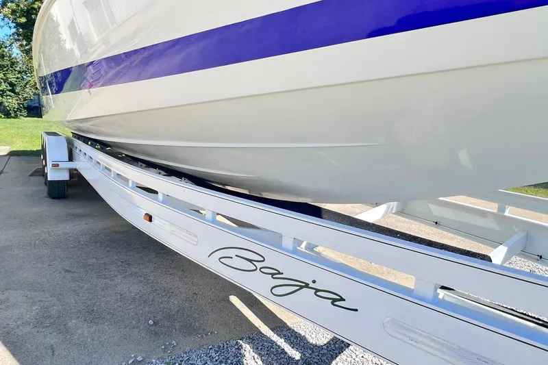 Slide: The Image of 1996 Baja .38 Special boat deck with blue and white design. - 92