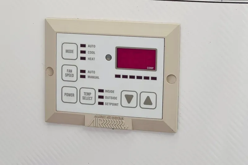 Slide: The Image of 1996 Baja .38 Special boat on trailer by a lakeside, sunny day. - 98