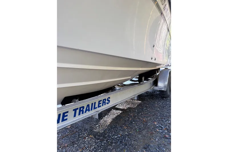 Slide: The Image of 2001 Grady-White Express 265 boat on trailer, side view. - 36