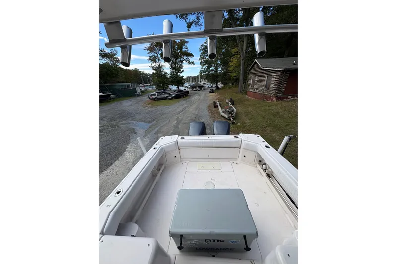 Slide: The Image of 2001 Grady-White Express 265 boat docked, view of deck and surrounding area. - 40