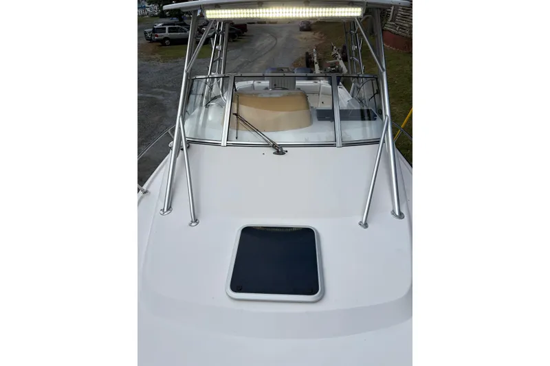 Slide: The Image of 2001 Grady-White Express 265 boat deck with windshield and overhead light. - 9