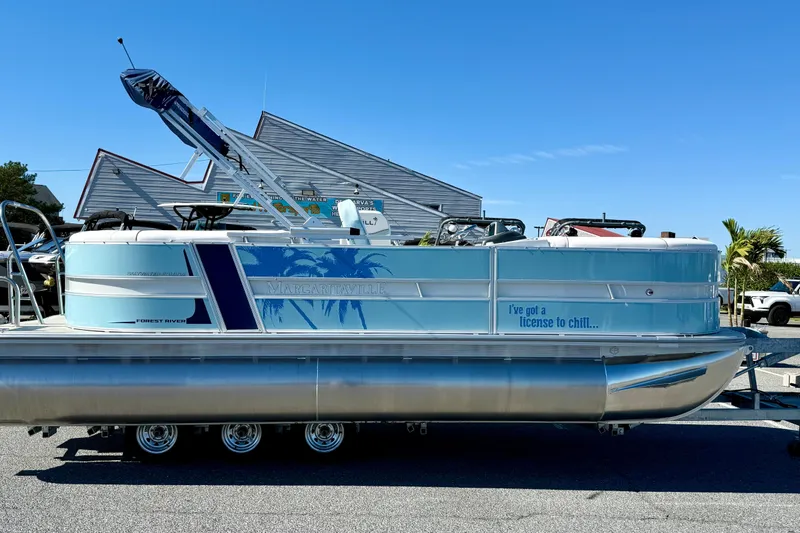 The Image of 2026 Berkshire 22RFX CHILL pontoon boat with "I've got a license to chill" slogan. - 0
