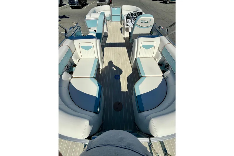 Slide: The Image of 2026 Berkshire 22RFX CHILL pontoon boat interior with spacious seating and modern design. - 11