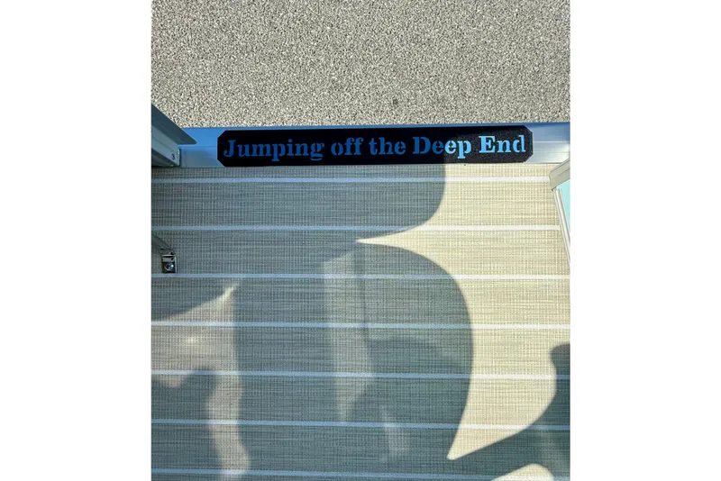 Slide: The Image of "Jumping off the Deep End" sign on Berkshire 22RFX CHILL boat, 2026 model. - 15