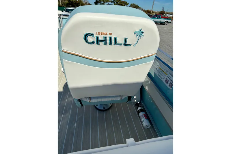 Slide: The Image of 2026 Berkshire 22RFX CHILL boat seat with "License to Chill" embroidery and palm tree design. - 16