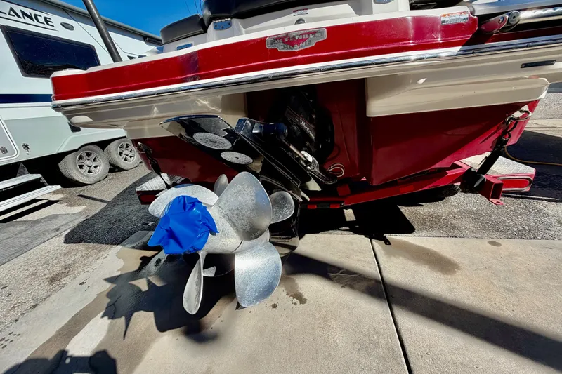 Slide: The Image of Rear view of a 2013 Chaparral 206 SSi boat with a covered propeller. - 6