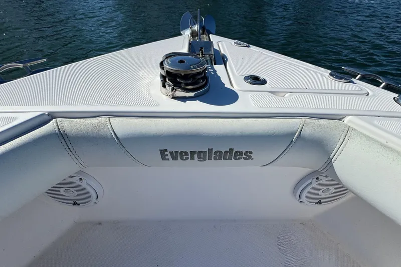 Slide: The Image of 2015 Everglades 255 Center Console boat bow with winch, on calm water. - 24