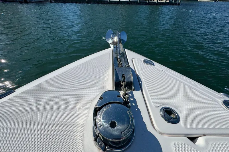 Slide: The Image of Bow of 2015 Everglades 255 Center Console boat with anchor, on water. - 25