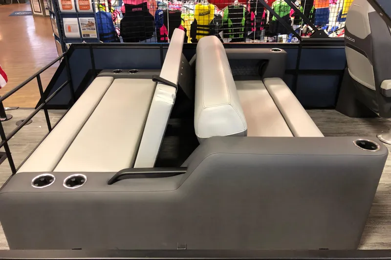 Slide: The Image of Modern Viaggio Z24S 2026 boat seating with cup holders, displayed in a showroom. - 10