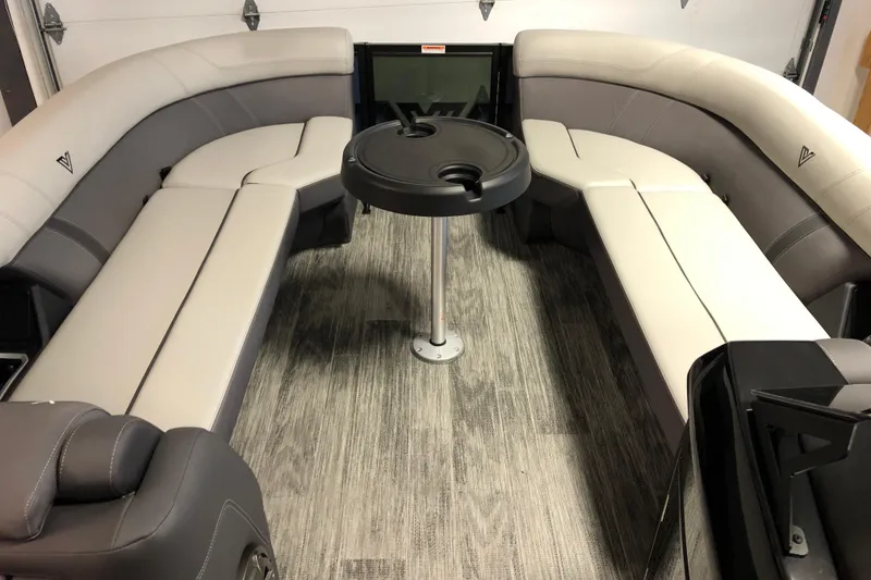 Slide: The Image of Luxurious 2026 Viaggio Z24S boat interior with plush seating and central table. - 14
