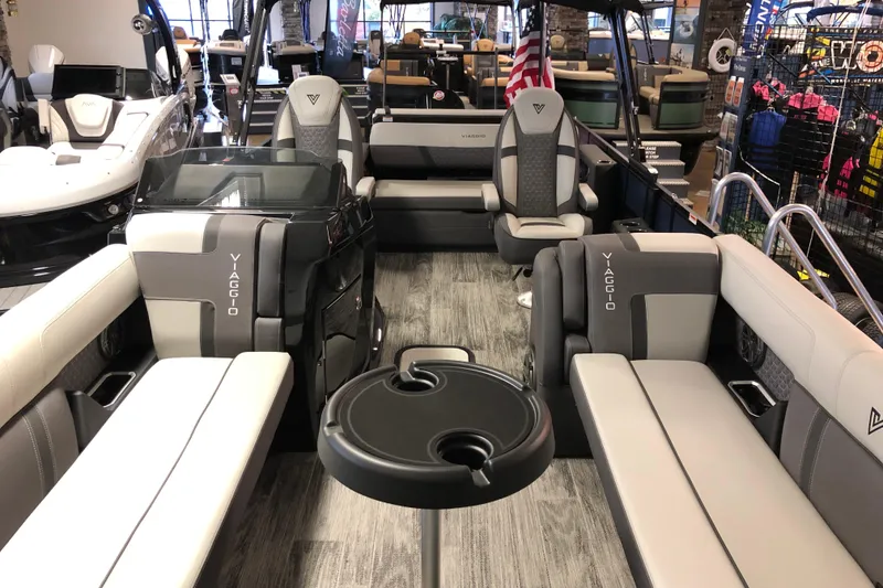 Slide: The Image of Luxurious 2026 Viaggio Z24S pontoon boat interior with plush seating and modern design. - 15