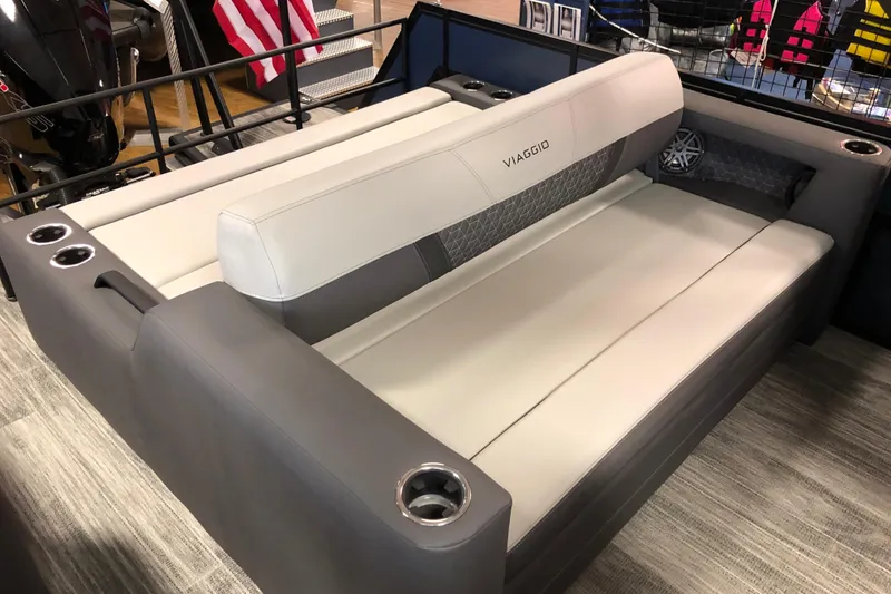 Slide: The Image of Luxurious seating on 2026 Viaggio Z24S boat with cup holders and sleek design. - 7