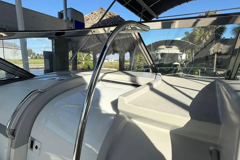 Slide: The Image of 2004 Formula 370 Super Sport boat interior with sleek design and waterfront view. - 24