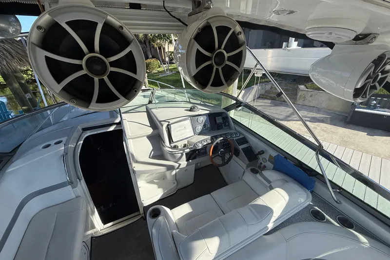 Slide: The Image of 2004 Formula 370 Super Sport boat interior with speakers and navigation controls. - 28