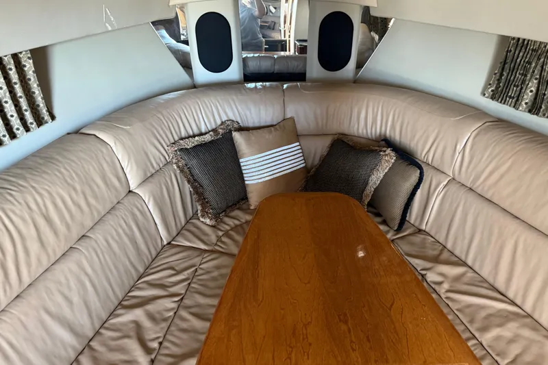 Slide: The Image of Luxurious interior of 2004 Formula 370 Super Sport boat with plush seating and cushions. - 40