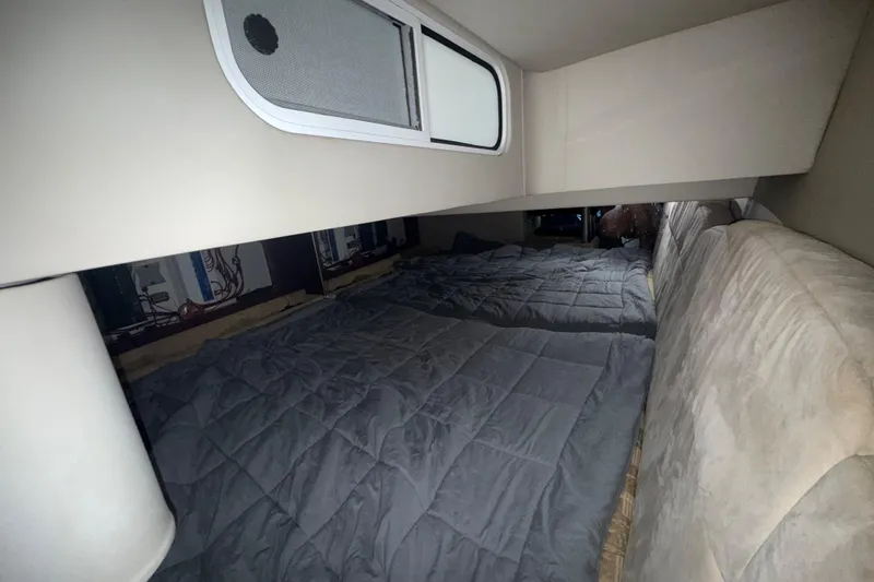 Slide: The Image of Interior cabin of 2004 Formula 370 Super Sport with cozy bedding. - 47