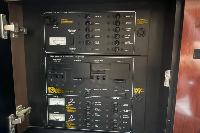 Slide: The Image of Electrical control panel of a 2004 Formula 370 Super Sport boat. - 51