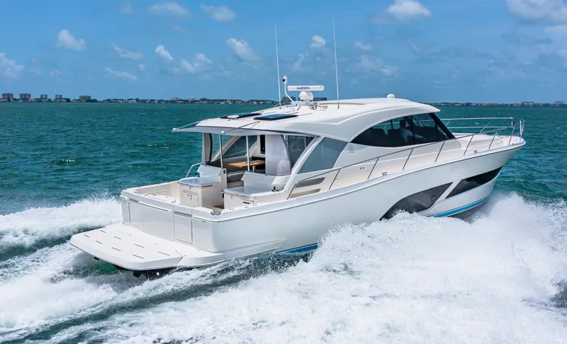 Slide: The Image of 2024 Riviera 505 SUV cruising on open water. - 10
