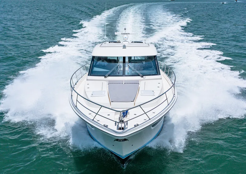 Slide: The Image of 2024 Riviera 505 SUV cruising on open water. - 12