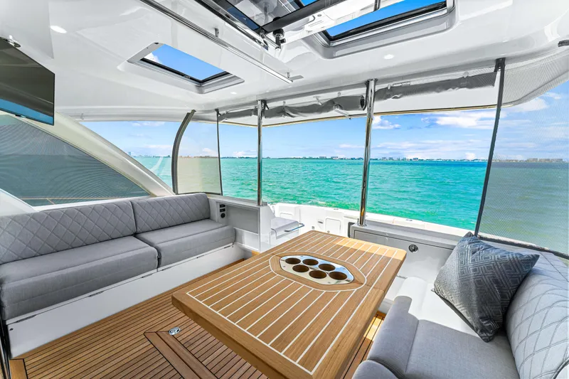 Slide: The Image of Luxurious interior of the 2024 Riviera 505 SUV yacht with ocean view. - 31