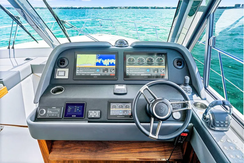 Slide: The Image of 2024 Riviera 505 SUV helm with advanced navigation and control systems. - 43