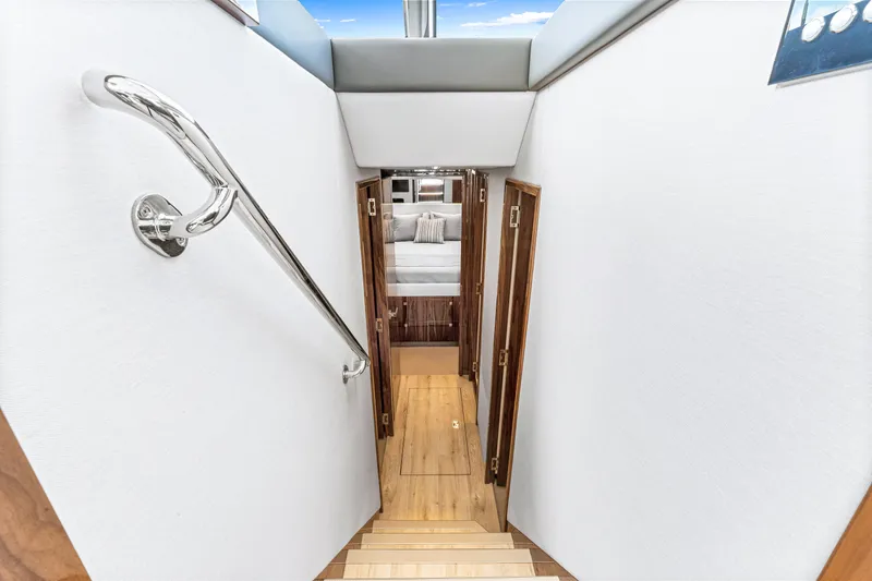 Slide: The Image of 2024 Riviera 505 SUV interior staircase leading to bedroom. - 44