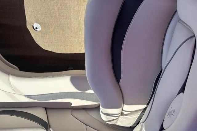 Slide: The Image of Luxurious interior seating of a 2000 Four Winns 238 Vista boat. - 19
