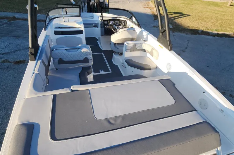 Slide: The Image of 2022 Bayliner VR6 Bowrider OB interior with spacious seating and modern design. - 8